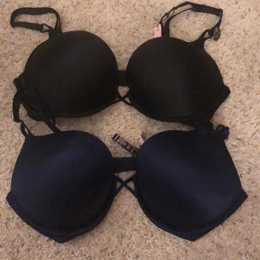 Two Victoria secret bombshell bras